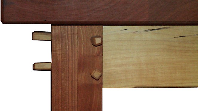Through-tenon joinery in maple and black cherry, wedged and exposed